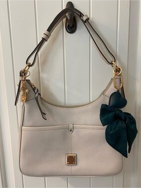 Dooney & Bourke Cream Shoulder Bag (charms not included) New used one time.